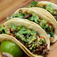 3 Steak Tacos · Steak pico de gallo tomatillo sauce and guacamole sauce