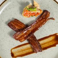 Thick Cut Bacon · maple bourbon glaze, spicy orange fennel relish