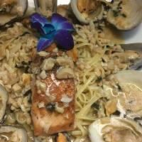 Seafood Combo Special · Marinara sauce, shrimp, clams, calamari, scungilli, chopped clams, mussels. With Salad & cho...