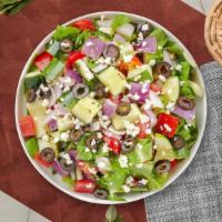 Greek Geek Salad · Romaine lettuce, tomatoes, cucumbers, red onions & feta cheese.