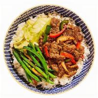 Black Pepper Steak Bowl · Wanna put a spin on your steak routine? Try our version of sliced sirloin stir-fried with on...