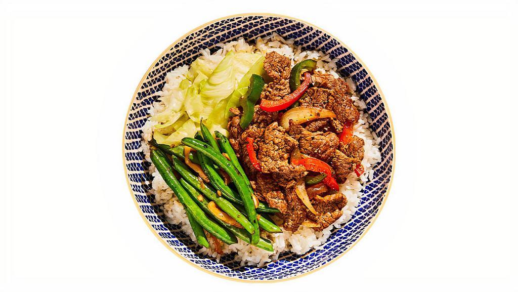 Black Pepper Steak Bowl · Wanna put a spin on your steak routine? Try our version of sliced sirloin stir-fried with onions, bell peppers, and a ton of black pepper. Comes with blistered string beans, seasonal green, and white rice. Fun fact: black pepper steak and rice is a tradition at our founder’s 4th of July BBQ.