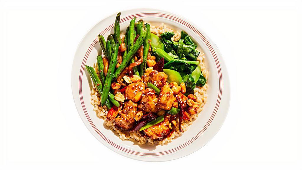 Kung Pao Chicken Bowl · Our most popular combo - Spicy tingly Kung Pao Chicken paired with crunchy blistered string beans served on a bed of brown rice with a side of seasonal green.