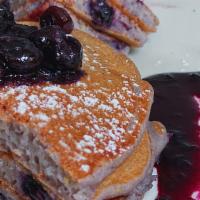 Blueberry Pancakes · Topped with blueberry compote. Served with fresh fruit.