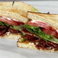 Bacon, Lettuce, Tomato · Apple wood smoked bacon, mixed greens, beefsteak tomatoes with mayonnaise. Served on toasted...