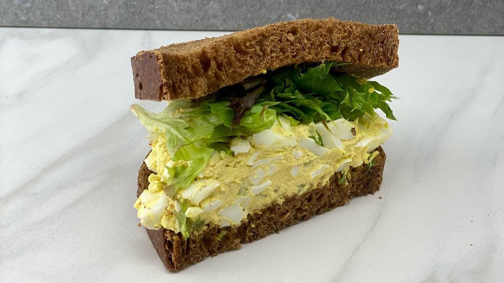 Egg Salad · Egg salad with crisp greens. Served on rye or pumpernickel bread.