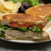 Chicken & Brie · Roasted Chicken, Brie Cheese, Greens, Tomato, Honey Mustard
Served on a Pressed Sourdough Br...