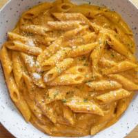 Penne Vodka · Penne pasta in our famous vodka sauce topped with mozzarella.