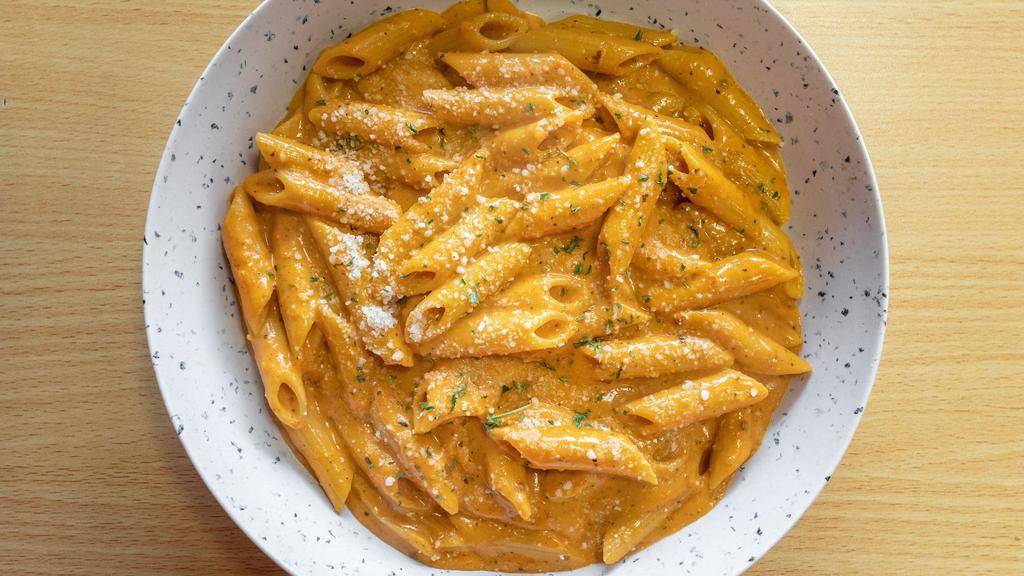 Penne Vodka · Penne pasta in our famous vodka sauce topped with mozzarella.
