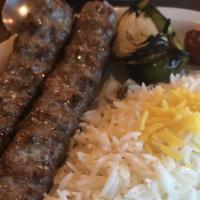 Kabob Bakhtiyar · Combination of juicy, marinated filet mignon and tender chicken, marinated on one large skew...