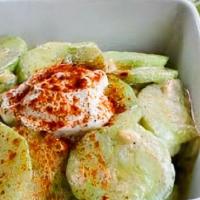 Spicy Cucumber Salad · Vegetarian. Crunchy cucumber in a tangy and spicy chili dressing.