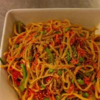 Chilled Noodle With Sesame Salad · Lo mein noodles tossed in a creamy sesame dressing with scallions and chili crisp.