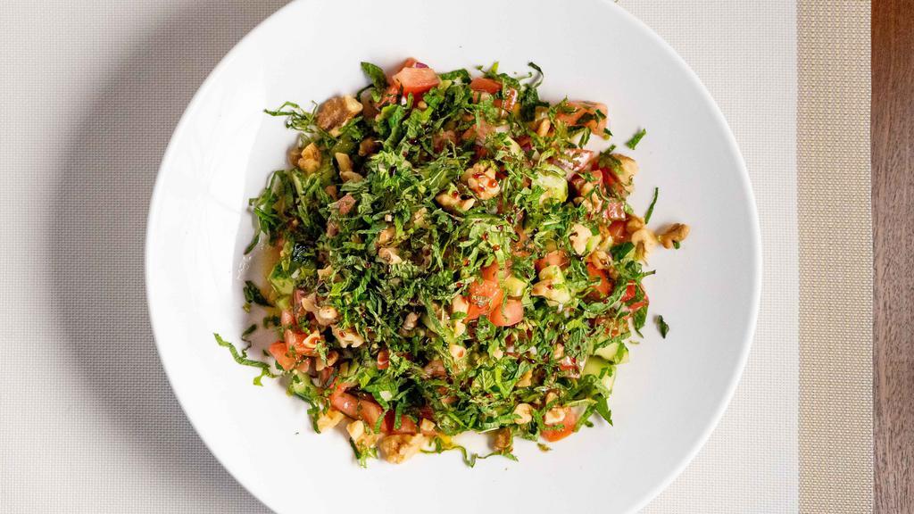 Cinar Special Salad · Chopped Tomatoes, cucumbers, red onion, parsley, fresh mint and walnut tossed with extra virgin olive oil and pomegranate juice.