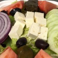 Traditional Greek Salad · Tomatoes,cucumbers,green peppers,onions,vinaigrette,lemon,olive oil,feta cheese.