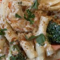 Seafood Ziti · Salmon, crab meat and shrimp in Cajun cream sauce with penne pasta and vegetables.
