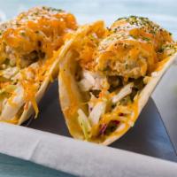 Fish Taco (2Pcs) · Fried catfish with coleslaw, romaine, rémoulade sauce, sweet aioli and cheddar cheese.