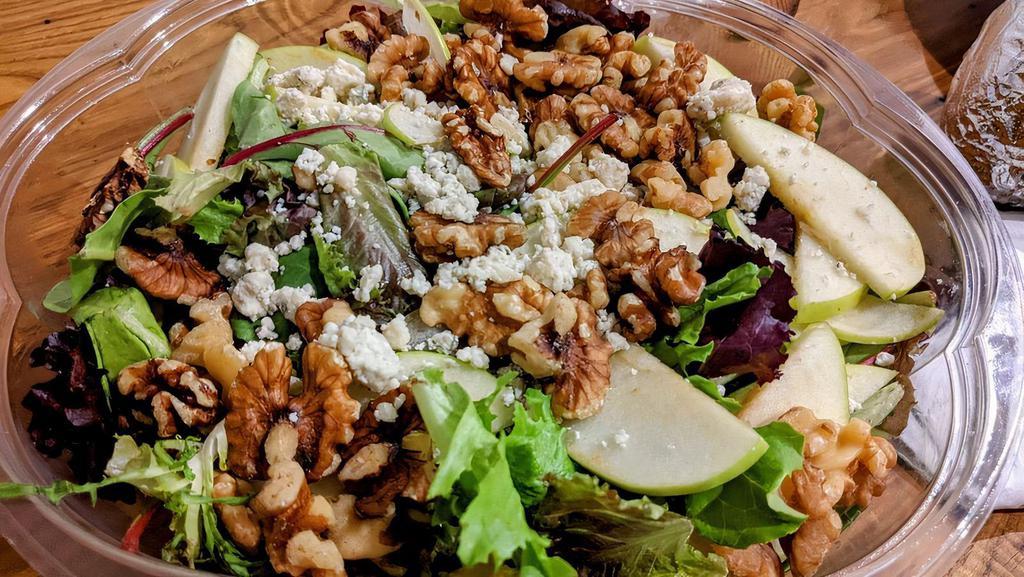 Neptune Salad · Romaine hearts, mixed greens, sliced apple, walnuts, crumbled bleu cheese with balsamic vinaigrette dressing.