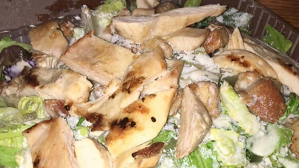 Caesar Salad · Fresh romaine lettuce topped with crispy croutons and our own Caesar dressing.