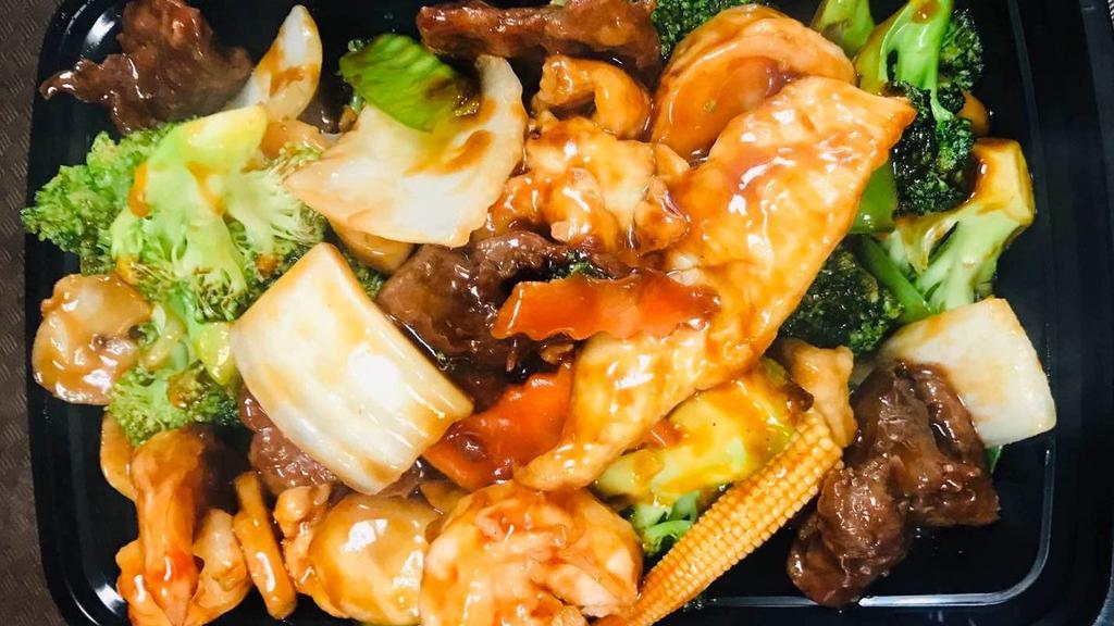Triple Delight · Shrimp, chicken, beef with mixed vegetables.