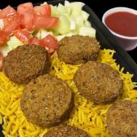 Falafel Over Rice · Rice platter with falafel(vegie) lettuce diced cucumber diced tomato and your choice of sauce.