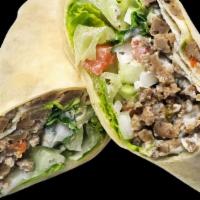 Mix Wrap · Comes with chicken, lamb, hummus, lettuce, tomatoes, cucumbers, and the sauce of your choice.