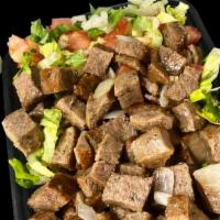 Lamb Over Salad · Salad platter with lamb lettuce diced cucumber diced tomato and choice of your sauce.