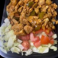 Chicken Over  Salad  · Salad platter with chicken lettuce diced cucumber diced tomato and choice of your sauce.