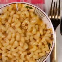 Mac & Cheese · Delicious a creamy Mac and Cheese classic style.
