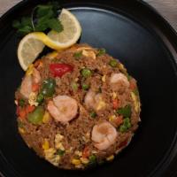 Shrimp Fried Rice (Arroz Frito Con Camarones) · Fried rice with carrots, green peans, green and red peppers, sweet corn, egg and shrimp.