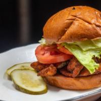 Chicken Sandwich · Choose between grilled chicken or a chicken cutlet. Comes with lettuce and tomato on a brioc...