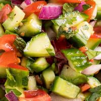 Israeli Salad · Tomato, Cucumber, Cilantro, Red Onion with olive oil and lemon juice
