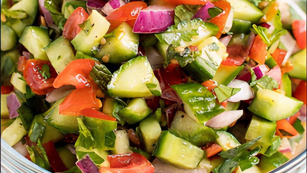 Israeli Salad · Tomato, Cucumber, Cilantro, Red Onion with olive oil and lemon juice