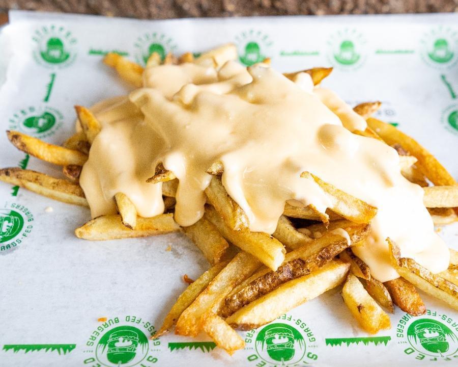 Cheese Fries · Fresh Cut Fries with our Five Cheese, Cheese Sauce on top!