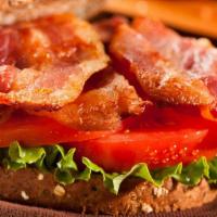 Hummus Blt Sandwich · Applewood bacon, lettuce, and tomato with hummus spread.