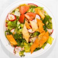 Fattoush · Vegetarian, chef recommendation. Green salad tomato, cucumber, radish onion, toasted pita, s...