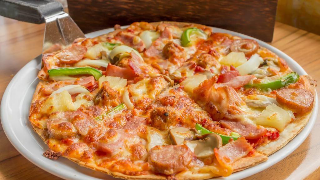 Chicken Ham Pizza · Hot out of the oven, tasty pizza topped with grilled chicken and savory ham. Additional toppings added per your request.