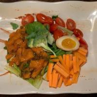 Poke Salmon Salad · Raw salmon, egg, mixed greens, carrots, cherry tomatoes tossed with Japanese sesame dressing.