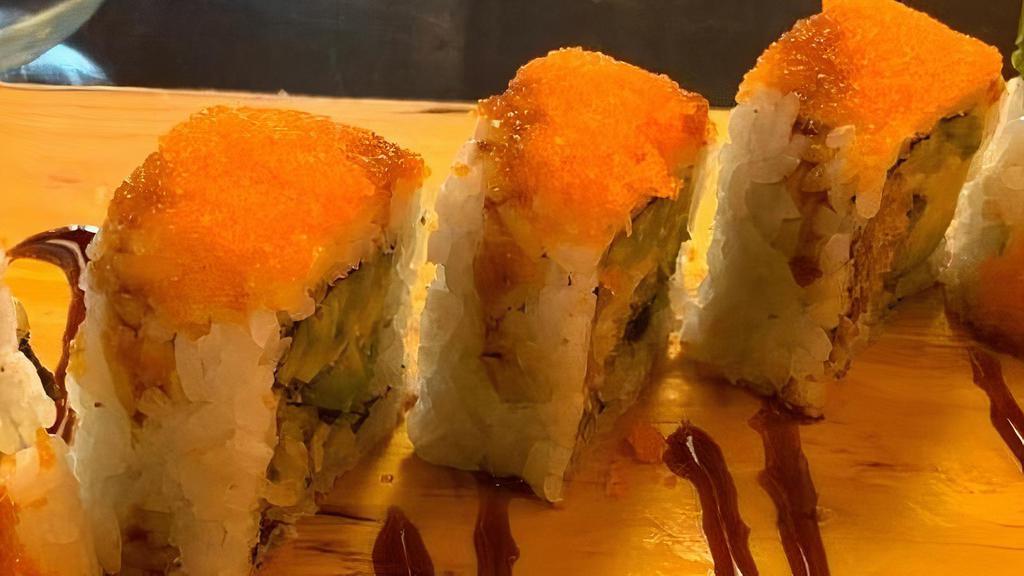 Soft Shell Crab Roll · Soft crab tempura, cucumber, avocado topped with masago, cut in 5 pieces with ell sauce