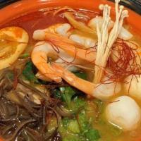 Seafood Ramen (Regular Or Spicy) · House shrimp based seafood soup topped with scallop, jumbo shrimps, fish balls, fish cakes, ...