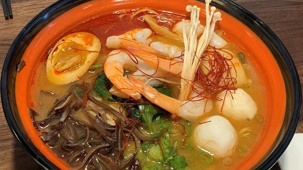 Seafood Ramen (Regular Or Spicy) · House shrimp based seafood soup topped with scallop, jumbo shrimps, fish balls, fish cakes, seasoned egg, bamboo shoots, kikurage mushroom and scallion.