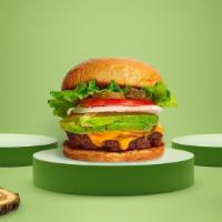 Guac Guac Burger · American beef patty topped with avocado, melted cheese, lettuce, tomato, onion, and pickles....