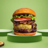 Swiss-Ter Act Burger · American beef patty topped with mushrooms, melted cheese, lettuce, tomato, onion, and pickle...