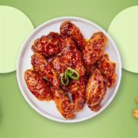 Seoul City Wings · Fresh chicken wings breaded, fried until golden brown, and tossed in soy sauce, brown sugar,...