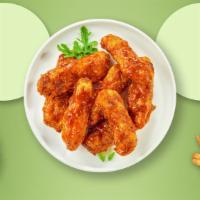 Bbq Bonanza Tenders · Chicken tenders breaded and fried until golden brown before being tossed in barbecue sauce.
