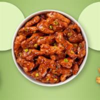 Chili With Me Tenders · Chicken tenders breaded, fried until golden brown before being tossed in sweet chili sauce.