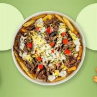 Philly Phase Fries · Steak, caramelized onions, bell peppers, and melted cheese topped on Idaho potato fries.