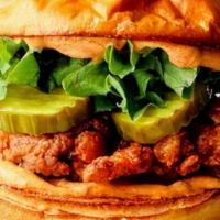 Original Chicken Sandwich · 6 oz fried chicken breast, dill pickle chips, lettuce, tomato, and special sauce on a brioch...
