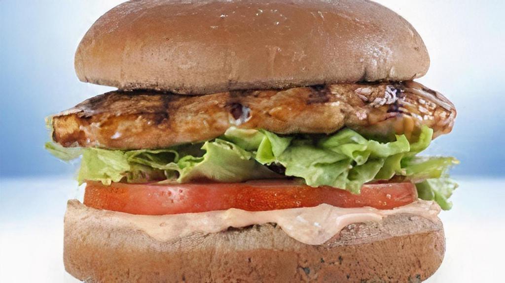 Grilled Chicken Sandwich · 6 oz grilled chicken breast, dill pickle chips, lettuce, tomato, and special sauce.