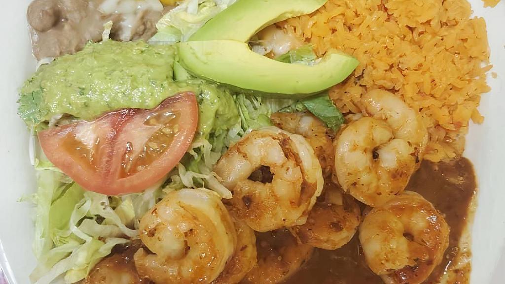 Camarones A La Diabla · Hot. Shrimp sautéed in our extra spicy sauce. Served with rice, beans and guacamole salad.
