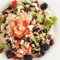Paolo'S Salad · Mesclun, strawberries, blueberries, sun-dried cranberries, almonds, goat cheese, and balsami...